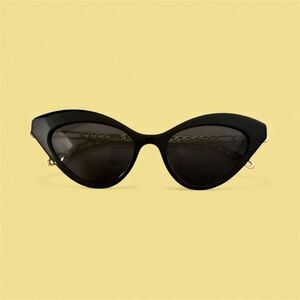 Gucci Black Cat-Eye Sunglasses with Gold Accents